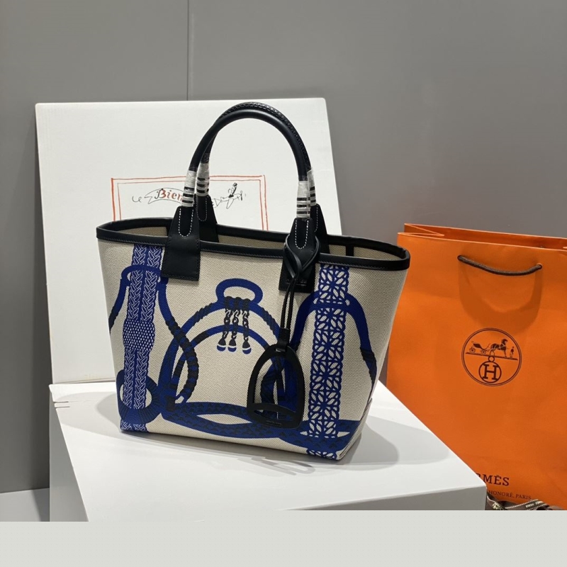 H**mes shopping bags